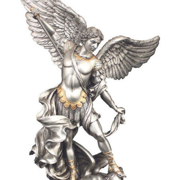 St. Michael in pewter style finish with gold highlights...